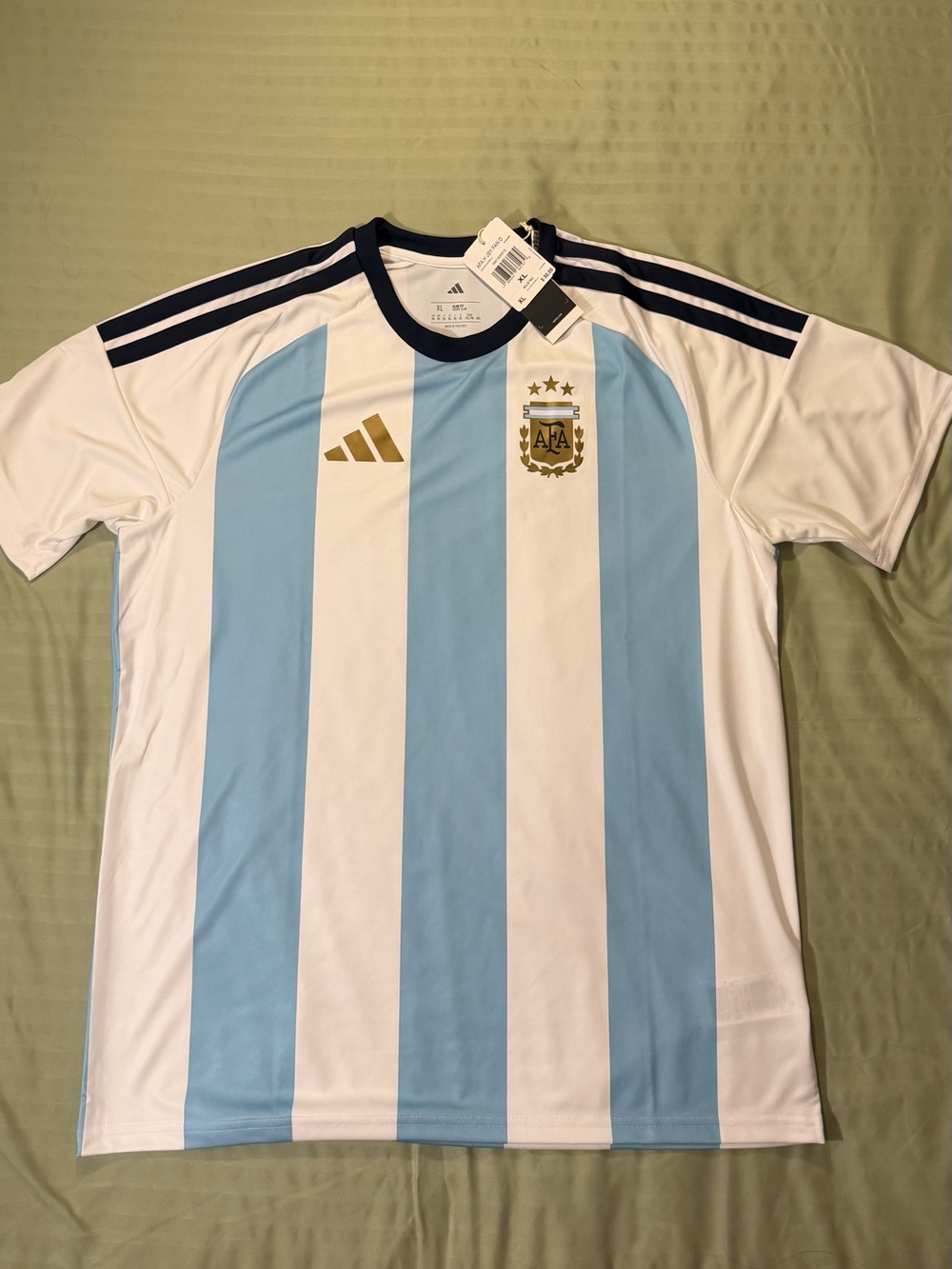 FIFA World Cup 2026 Gold and Light Blue AFA Crest Graphic Tee